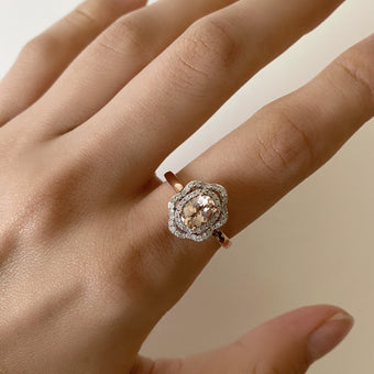 9ct Rose Gold Morganite 7x5mm 0.65 Carats and Diamonds 0.25 Carats Floral Halo Ring